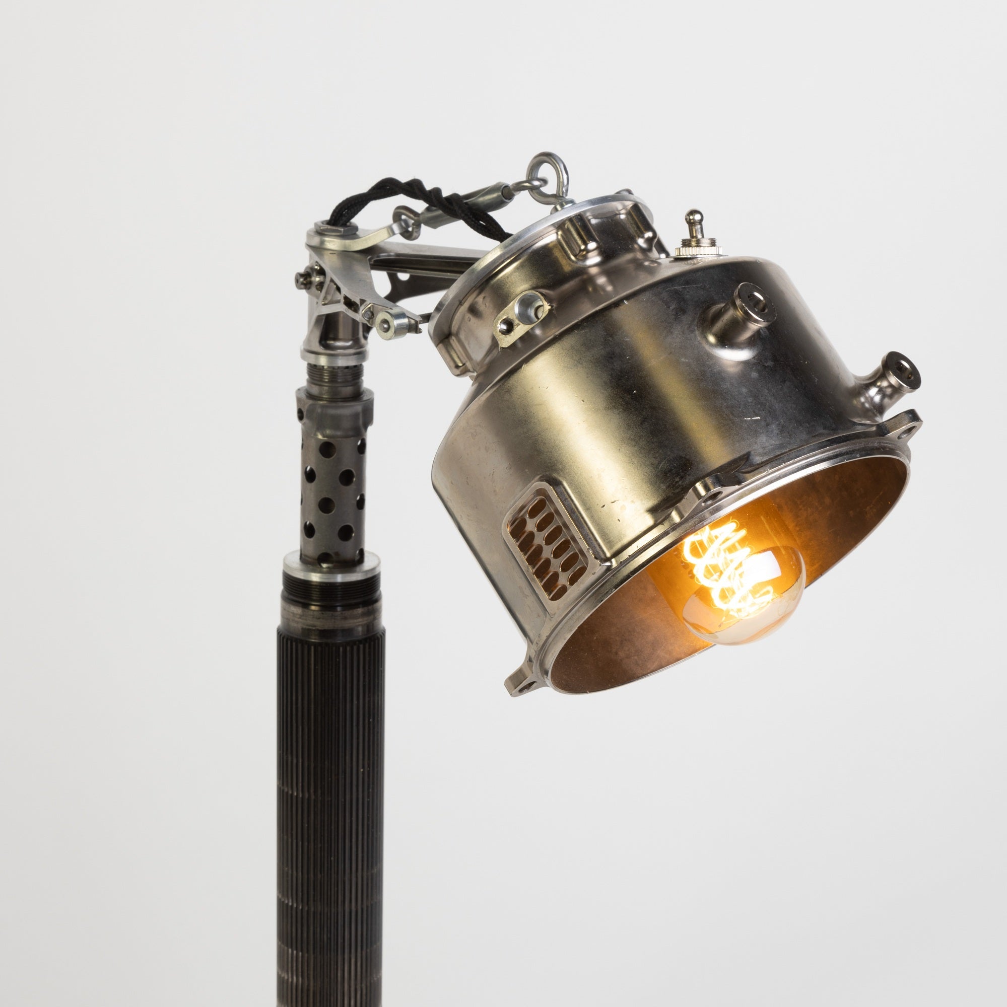 Formula one racing parts transformed into a desk lamp