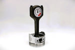 Load image into Gallery viewer, A polished car piston clock with a black clock ring and white and red RPM clock face.
