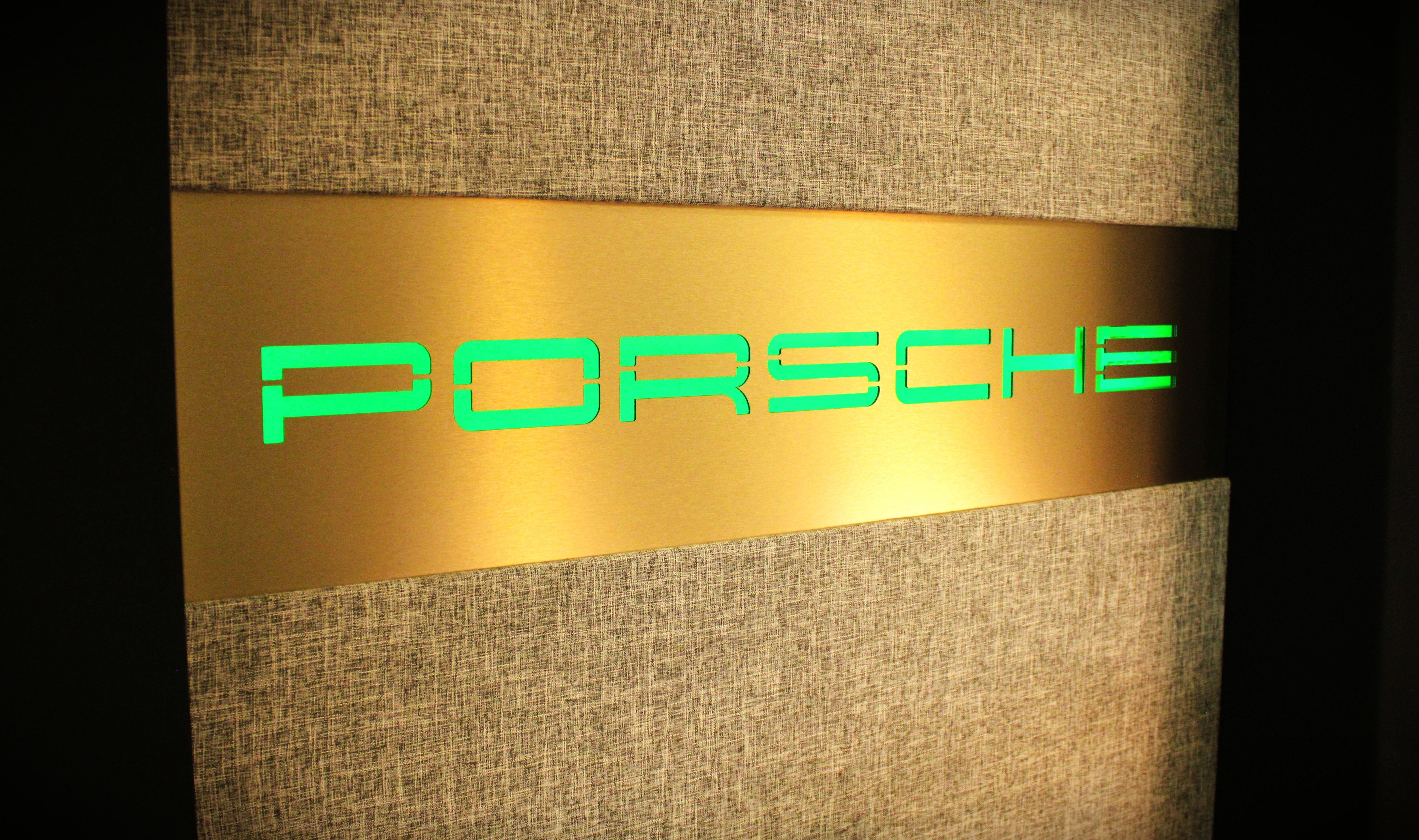 Porsche engine display with integrated high-performance audio