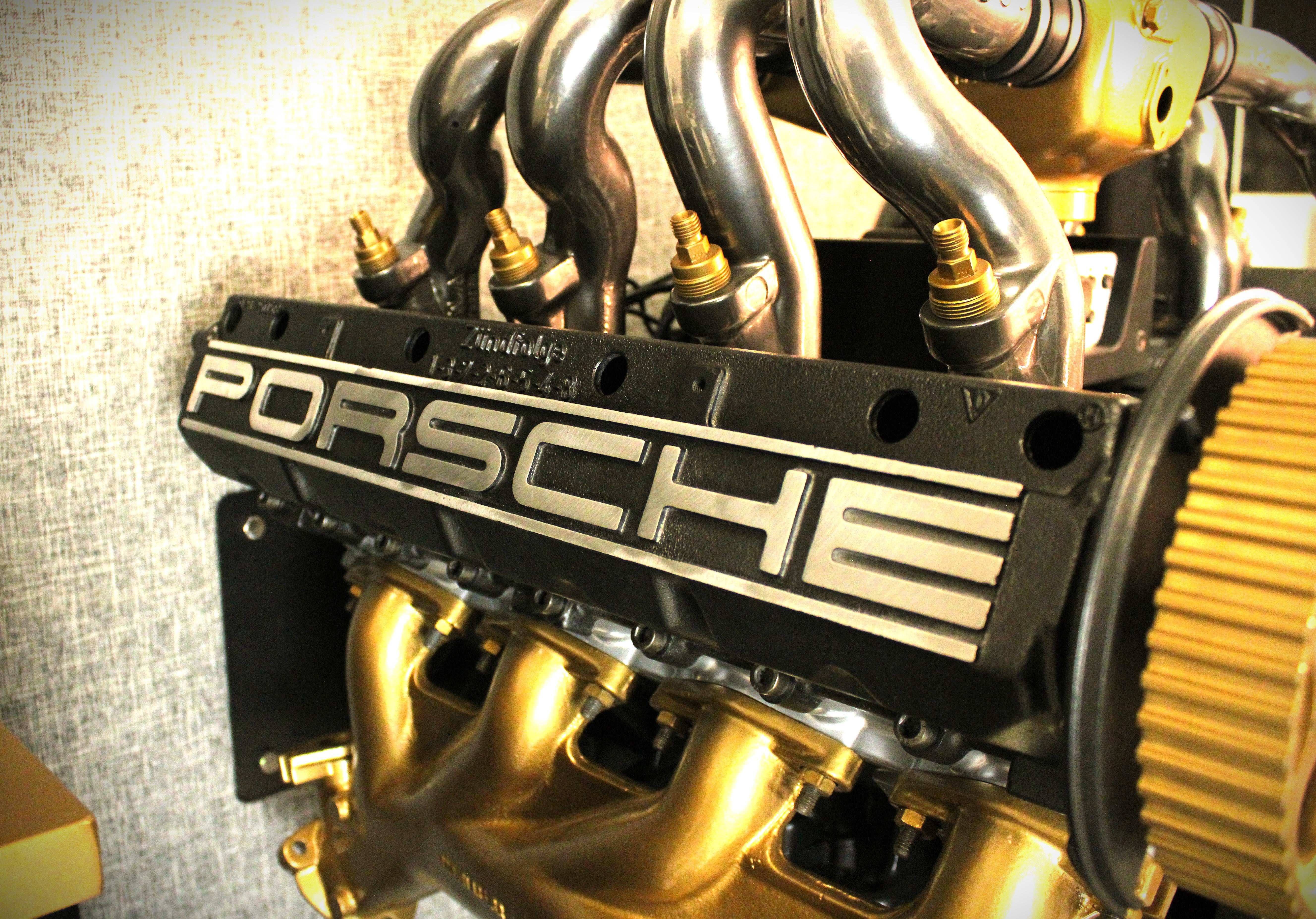 Porsche 928 engine sculpture with dual subwoofer audio system