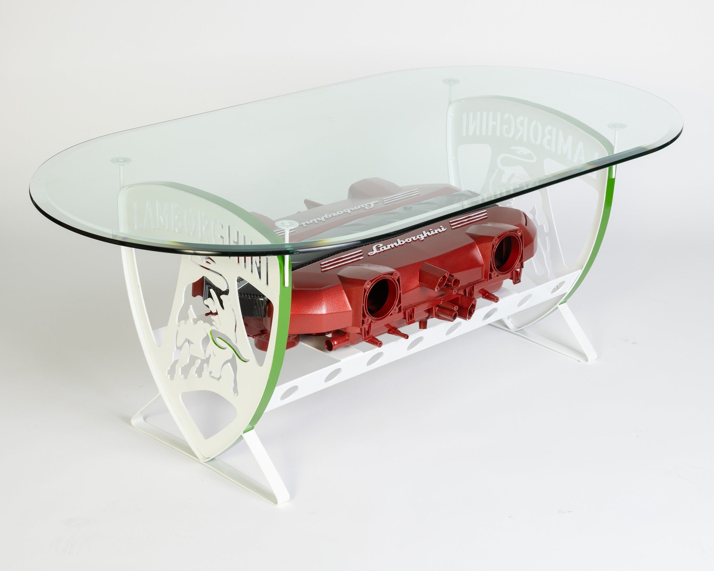 Glass coffee table with red engine design on a white background