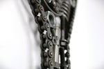 Load image into Gallery viewer, Close-up view of a letter Y made out of real car parts, outlined with a timing chain.
