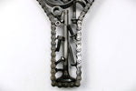 Load image into Gallery viewer, Close-up view of a letter Y made out of real car parts, outlined with a timing chain.
