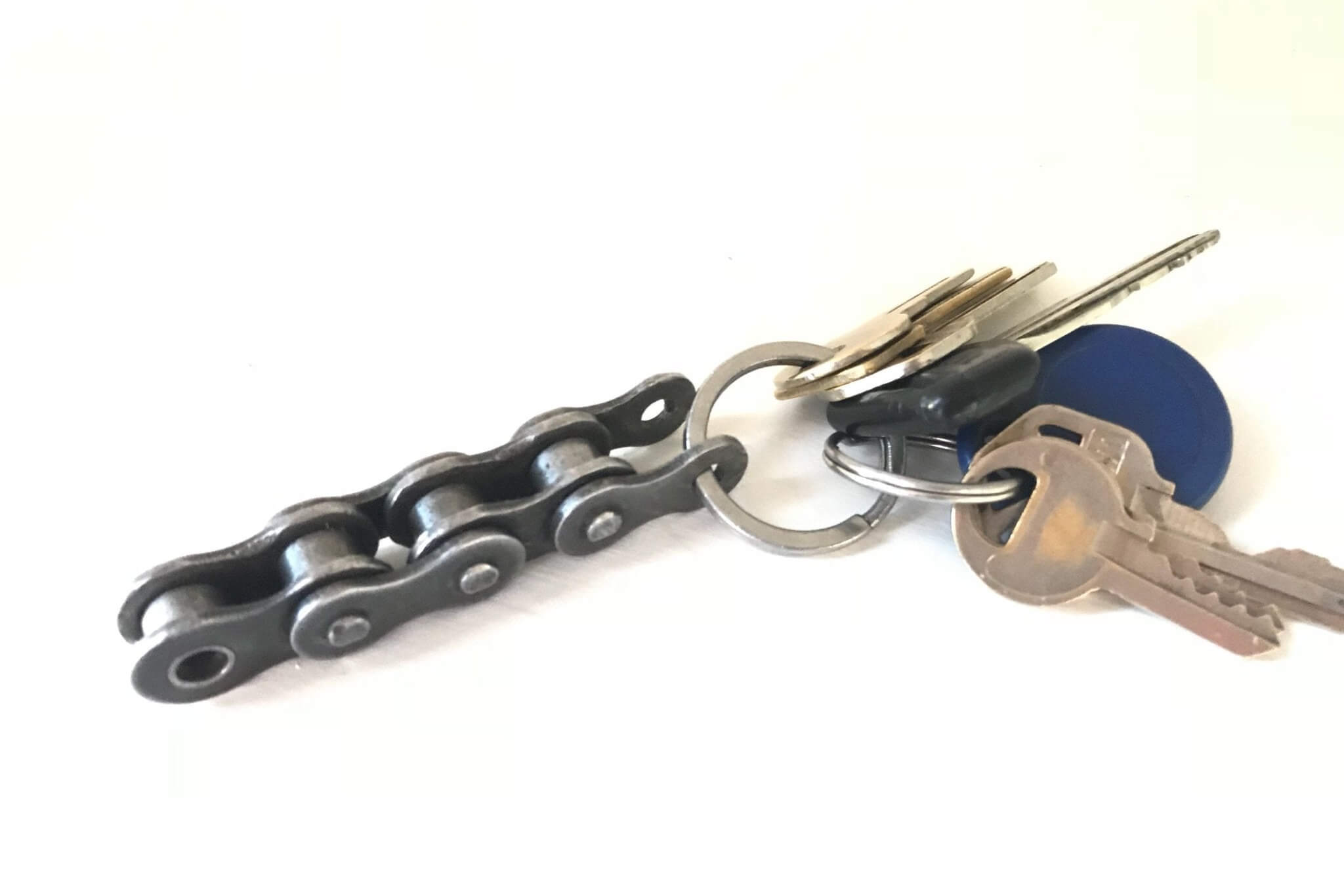 Keychain handcrafted from a genuine polished motorcycle chain.
