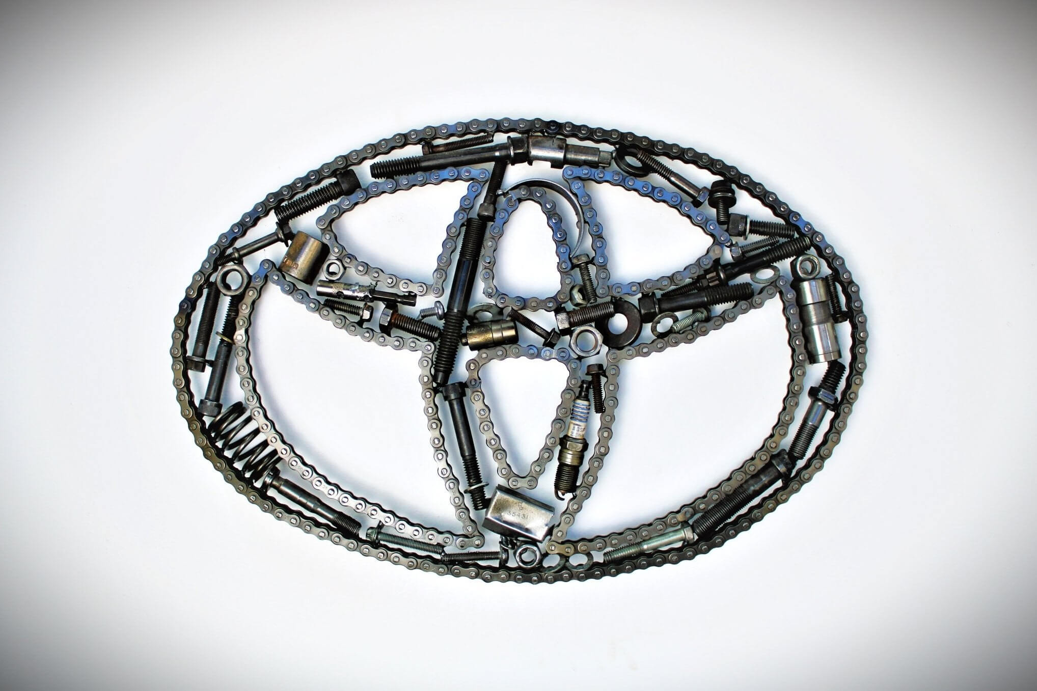 Toyota Logo Car Part Art - Automotive Wall Art, Handcrafted Gift for Auto Enthusiasts - Ben's Auto Decor
