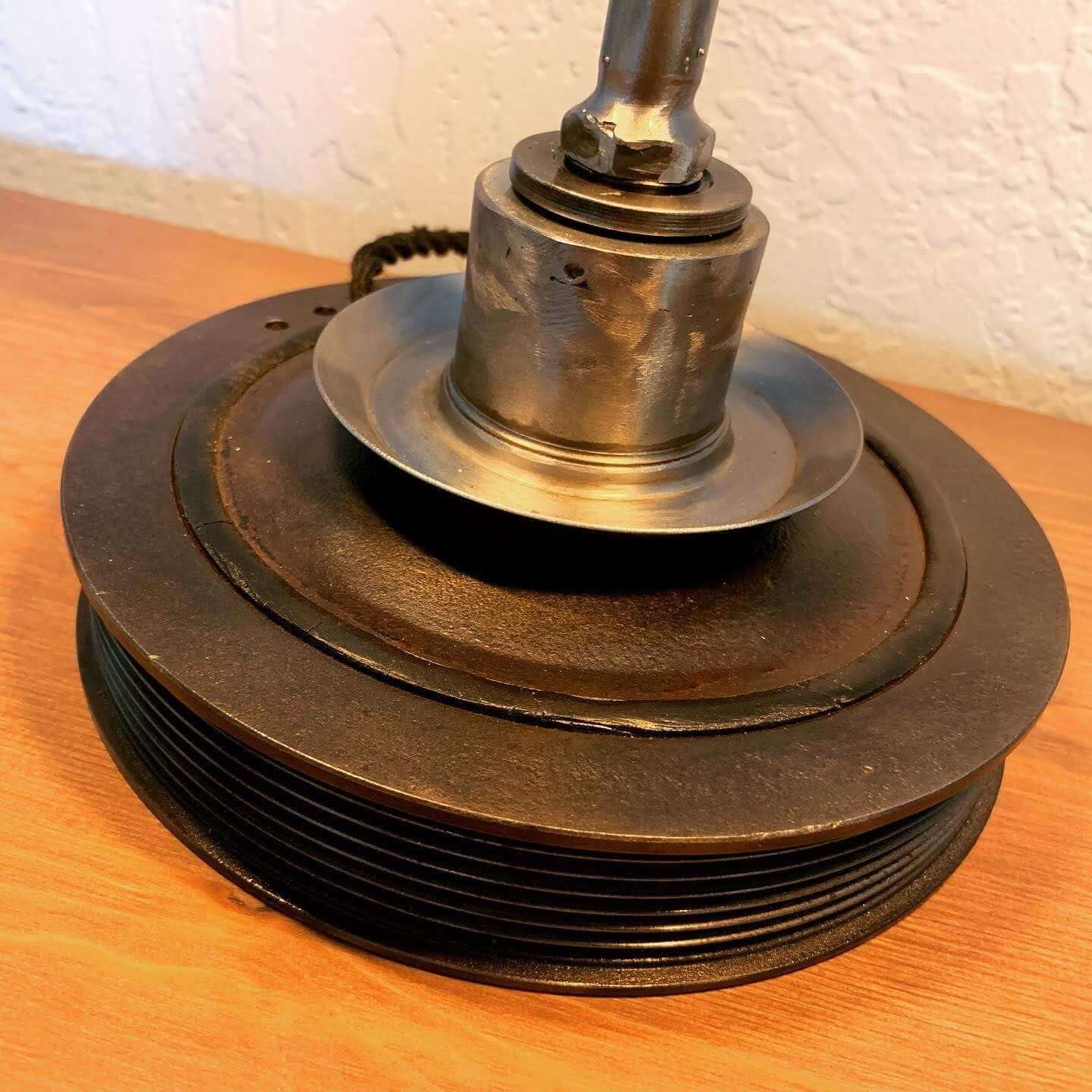 Tabletop lamp handcrafted from a genuine polished car valve cover, engraved cap and LED lightbulbs.