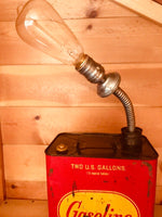 Load image into Gallery viewer, Lamp made out of a red and yellow vintage gas can with an incandescent lightbulb.
