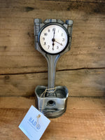 Load image into Gallery viewer, A silver desk clock made out of a genuine Audi car engine piston.
