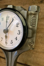 Load image into Gallery viewer, Side view of a unique, upcycled piston clock made from an Audi car engine piston.
