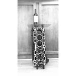 Load image into Gallery viewer, Engine block wine rack finished in black with a square glass top, wine bottles stored in its side and a wine bottle on top.
