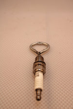 Load image into Gallery viewer, Bottle opener made from a car&#39;s spark plug.
