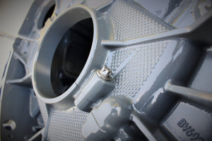 Close-up view of a Porsche engine wine rack finished in gray.