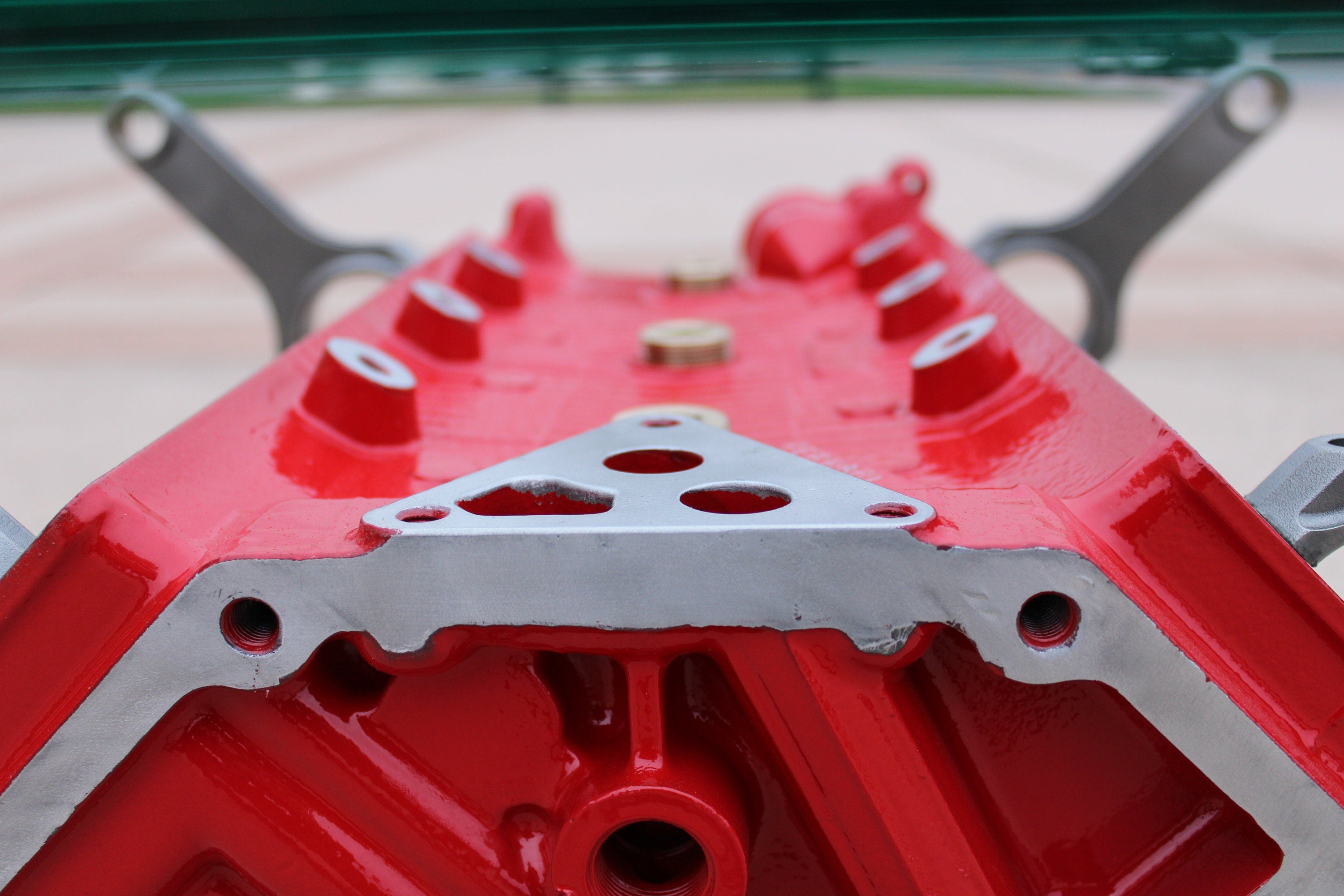 Close-up view of a red engine block coffee table.