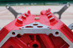 Load image into Gallery viewer, Close-up view of a red engine block coffee table.
