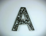 Load image into Gallery viewer, A letter A made out of real car parts, outlined with a timing chain.
