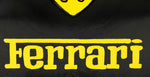Load image into Gallery viewer, Close-up of the Ferrari logo on a black and yellow painted gas can.
