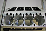 Load image into Gallery viewer, Close-up view of a Top Fuel aluminum engine block coffee table finished in black and silver.
