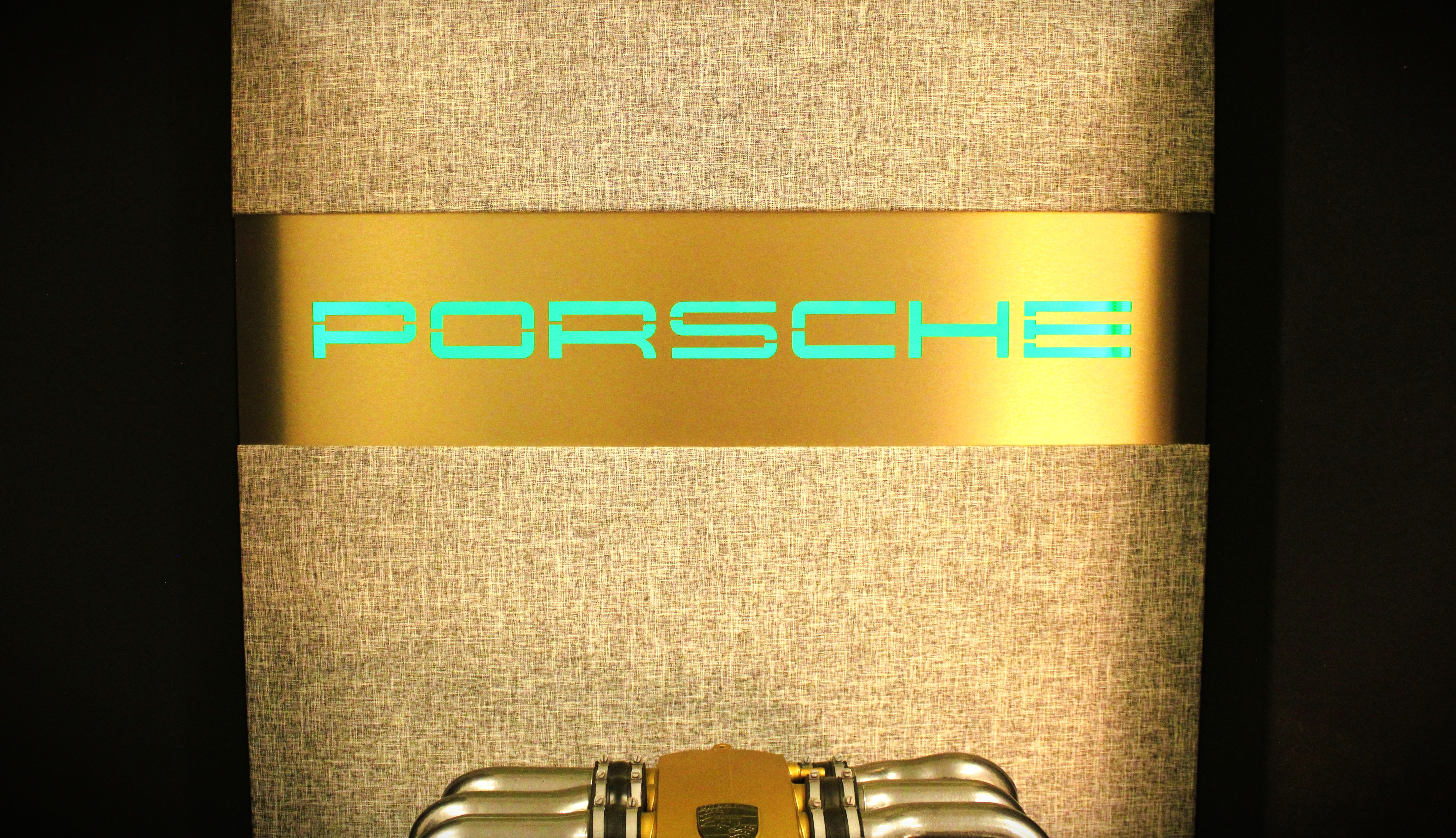 Porsche engine display with integrated high-performance audio