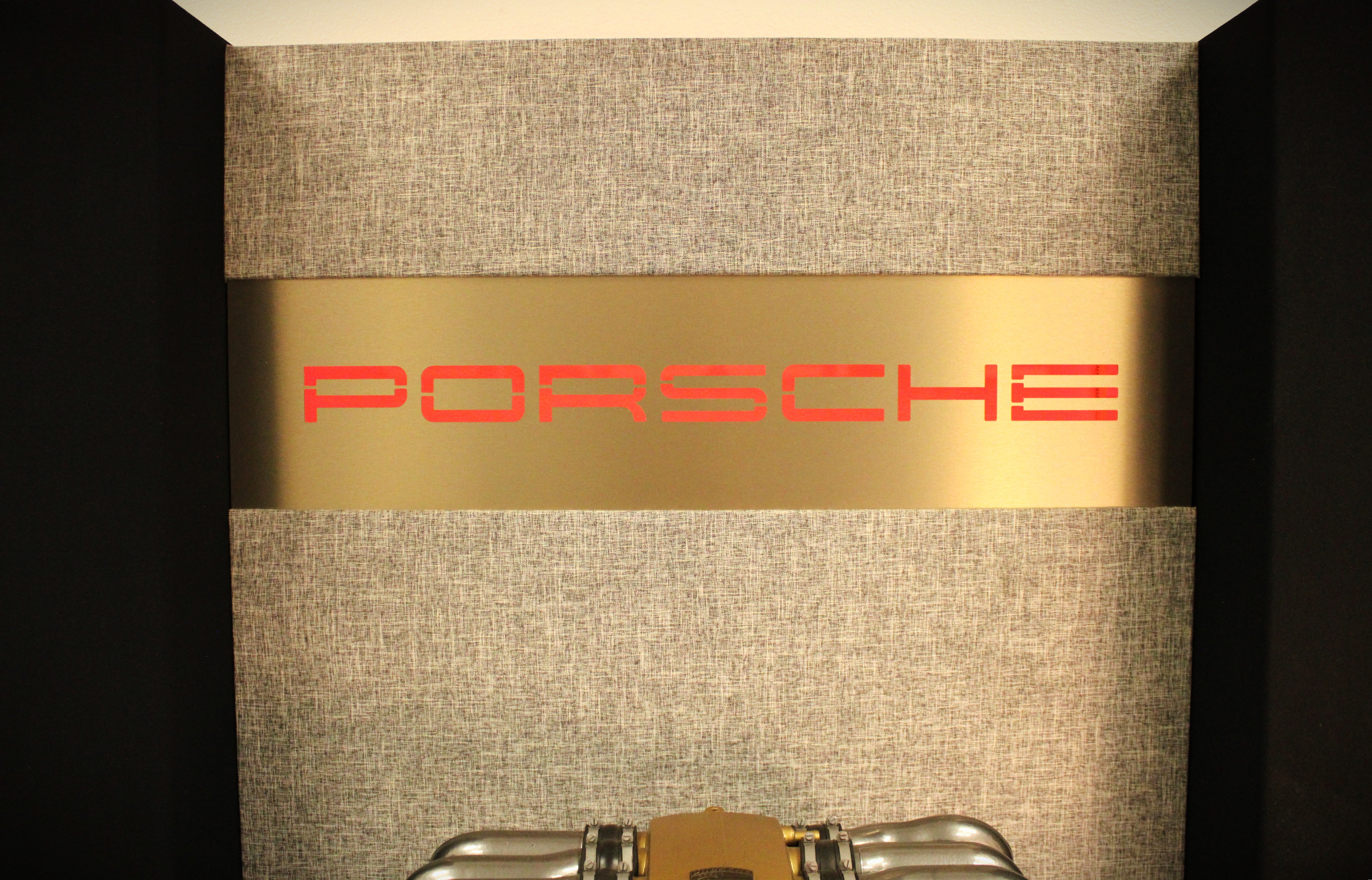 Genuine Porsche 928 V8 displayed in custom audio installation