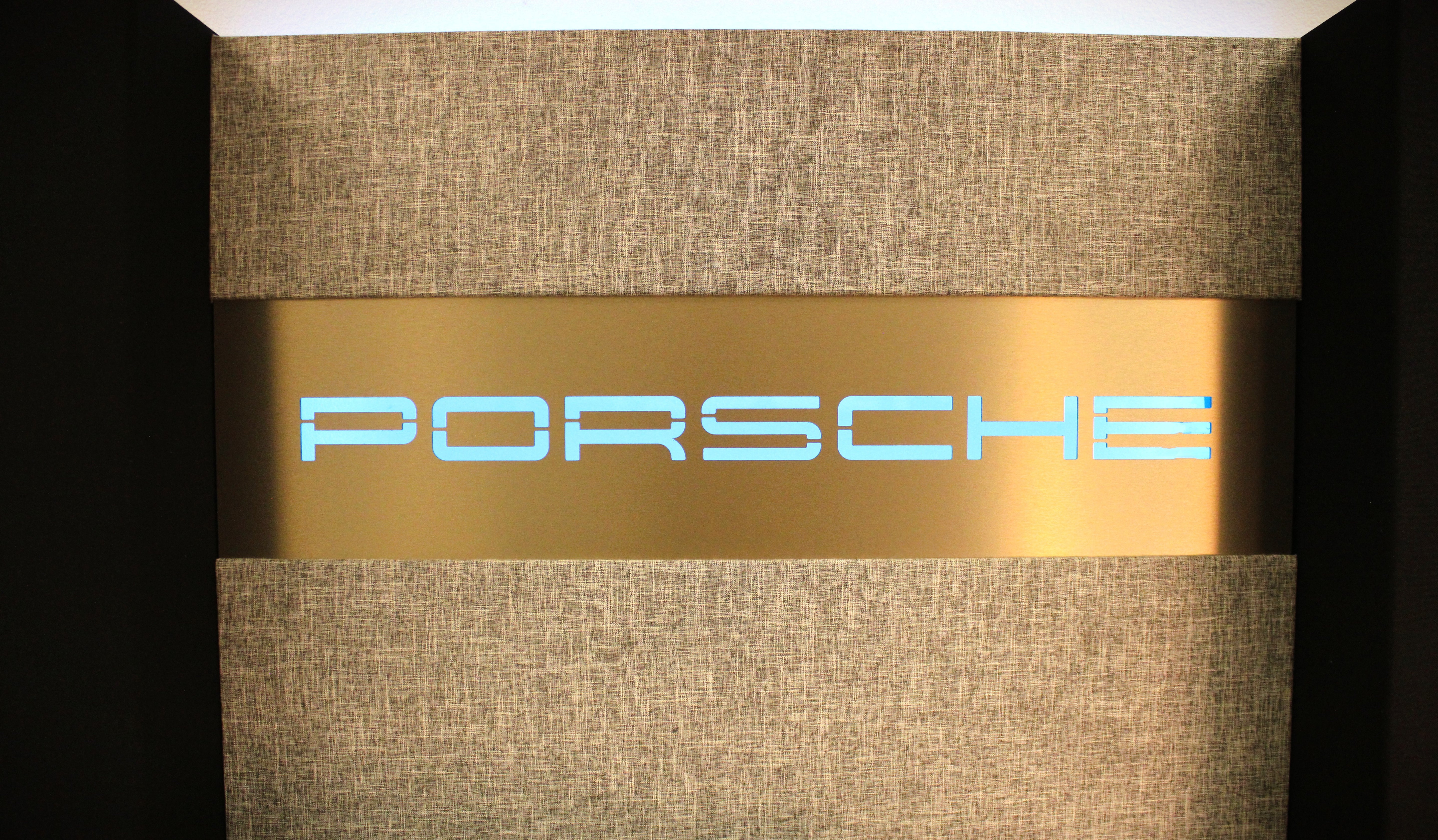 Genuine Porsche 928 V8 displayed in custom audio installation