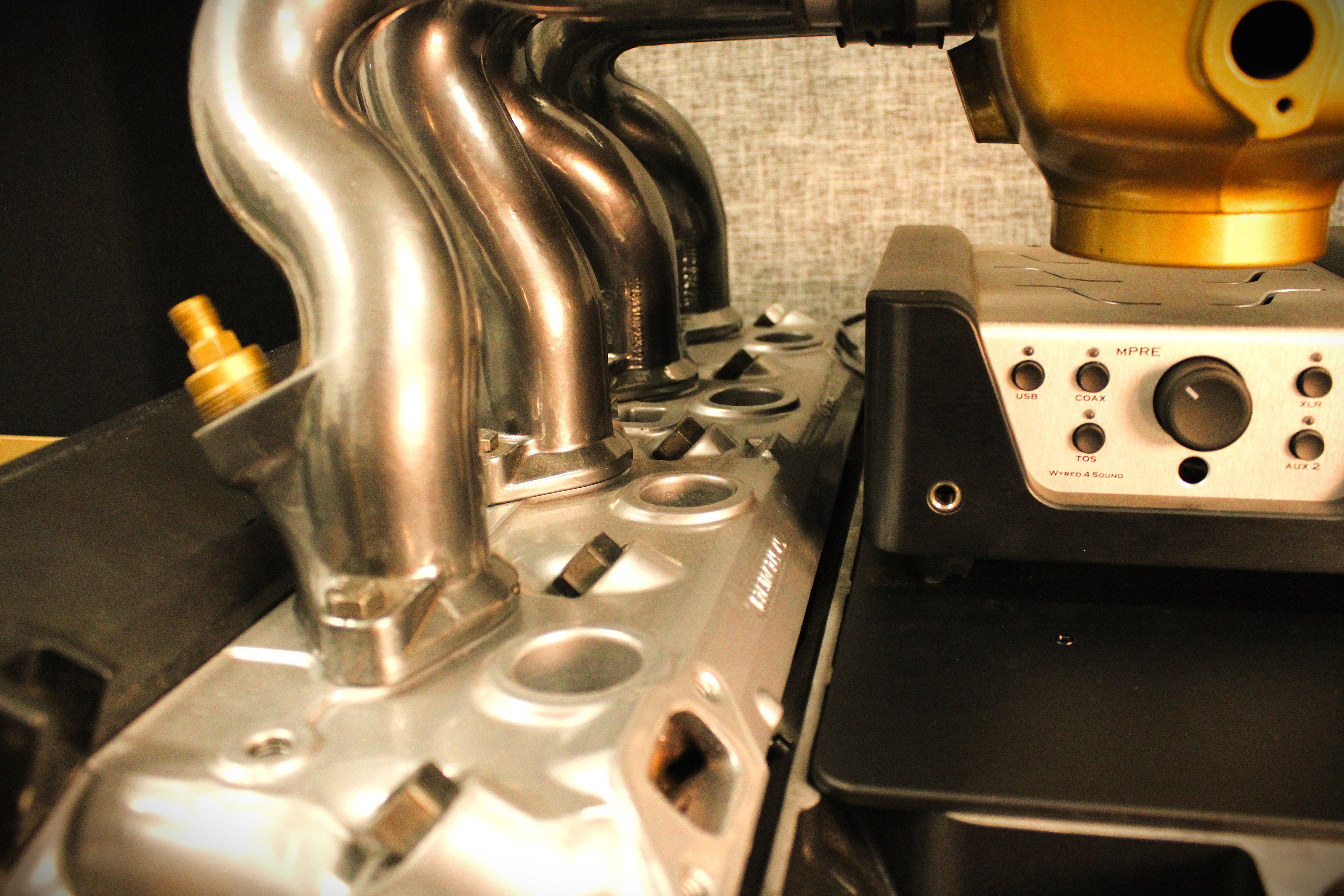 Porsche engine display with integrated high-performance audio