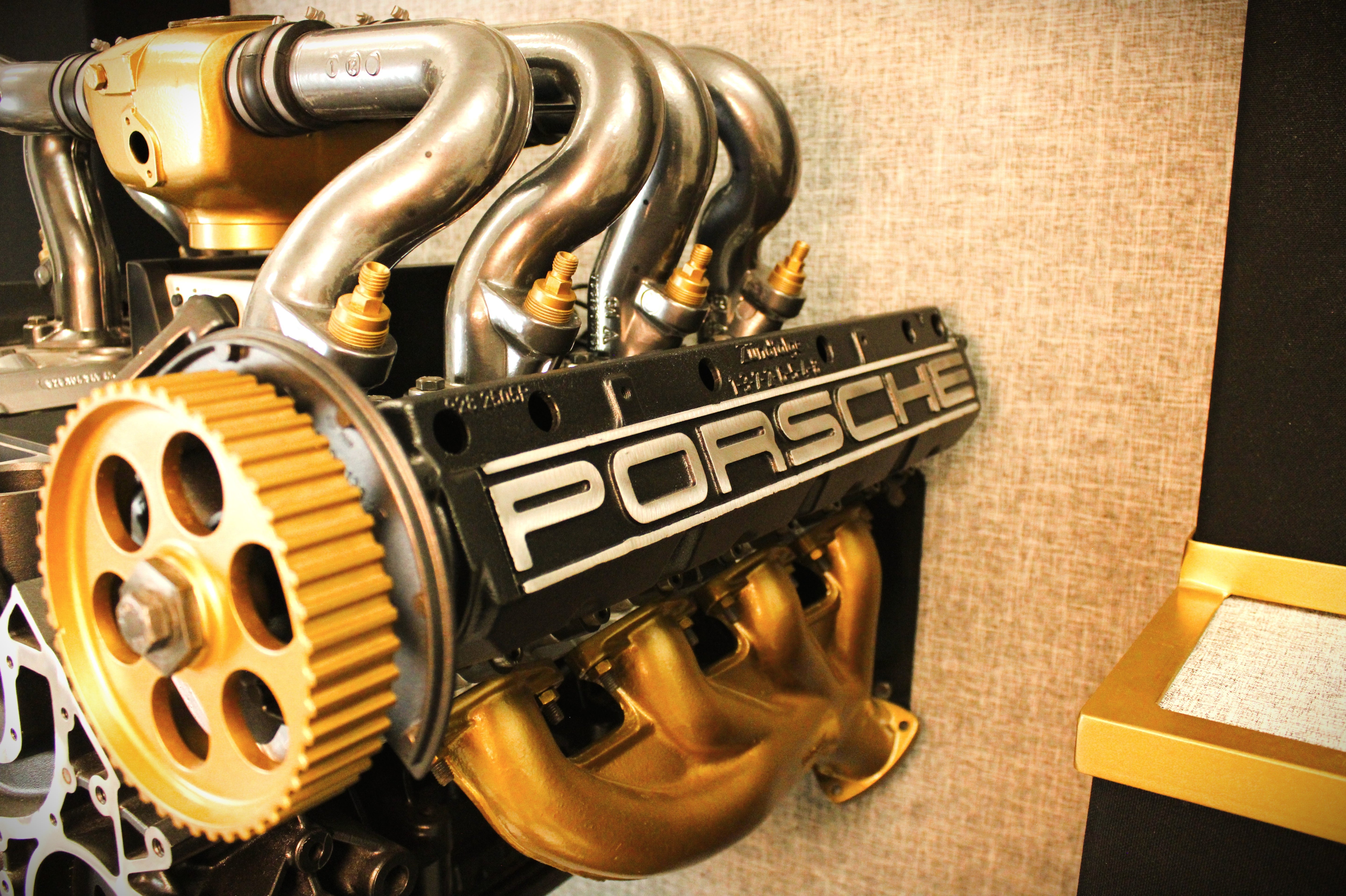 Porsche 928 engine sculpture with dual subwoofer audio system