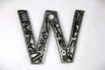 Load image into Gallery viewer, A letter W made out of real car parts, outlined with a timing chain.
