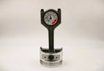 Load image into Gallery viewer, A polished car piston clock with a black clock ring and white and red RPM clock face.
