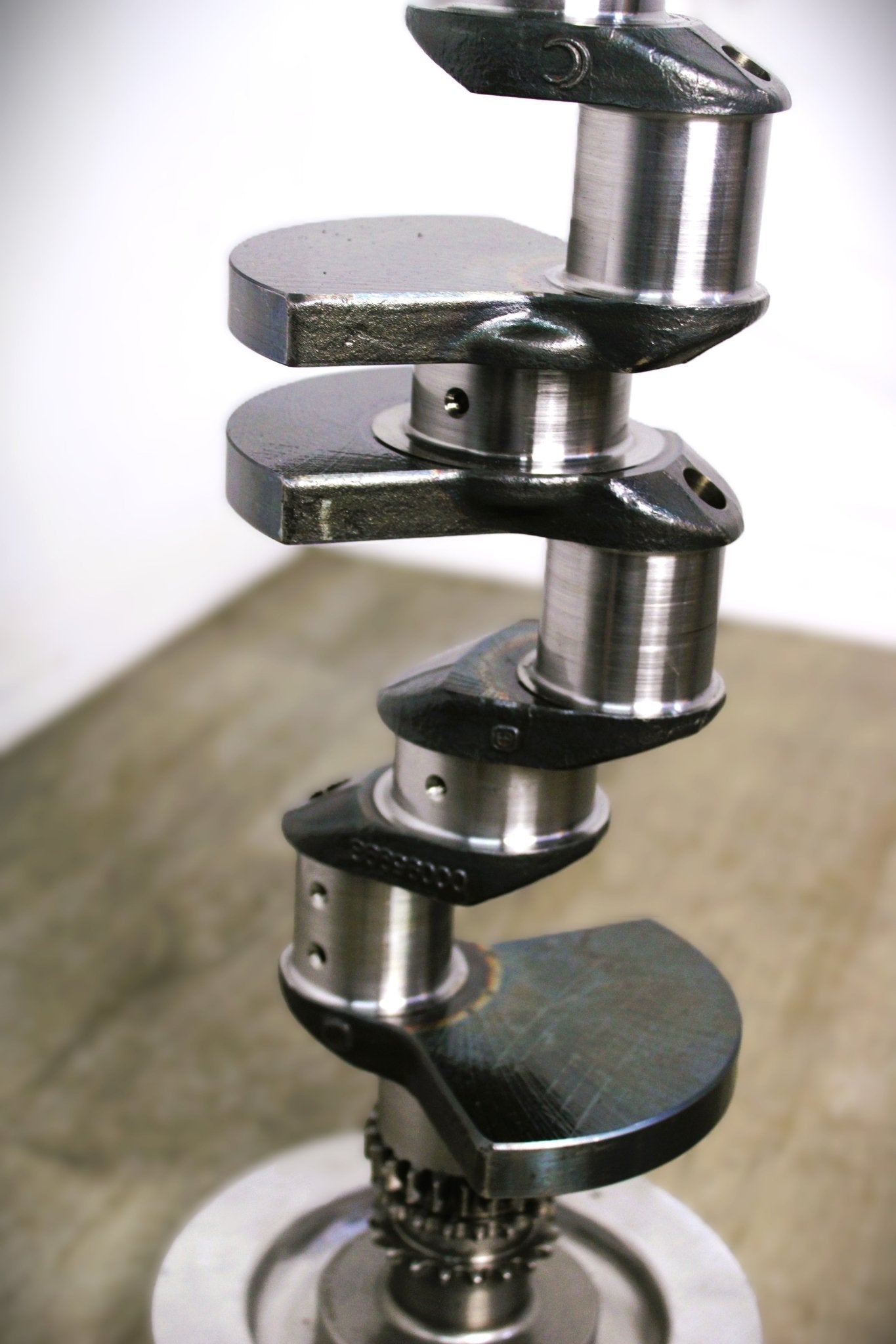 A crankshaft turned into a side table A crankshaft turned into a side table