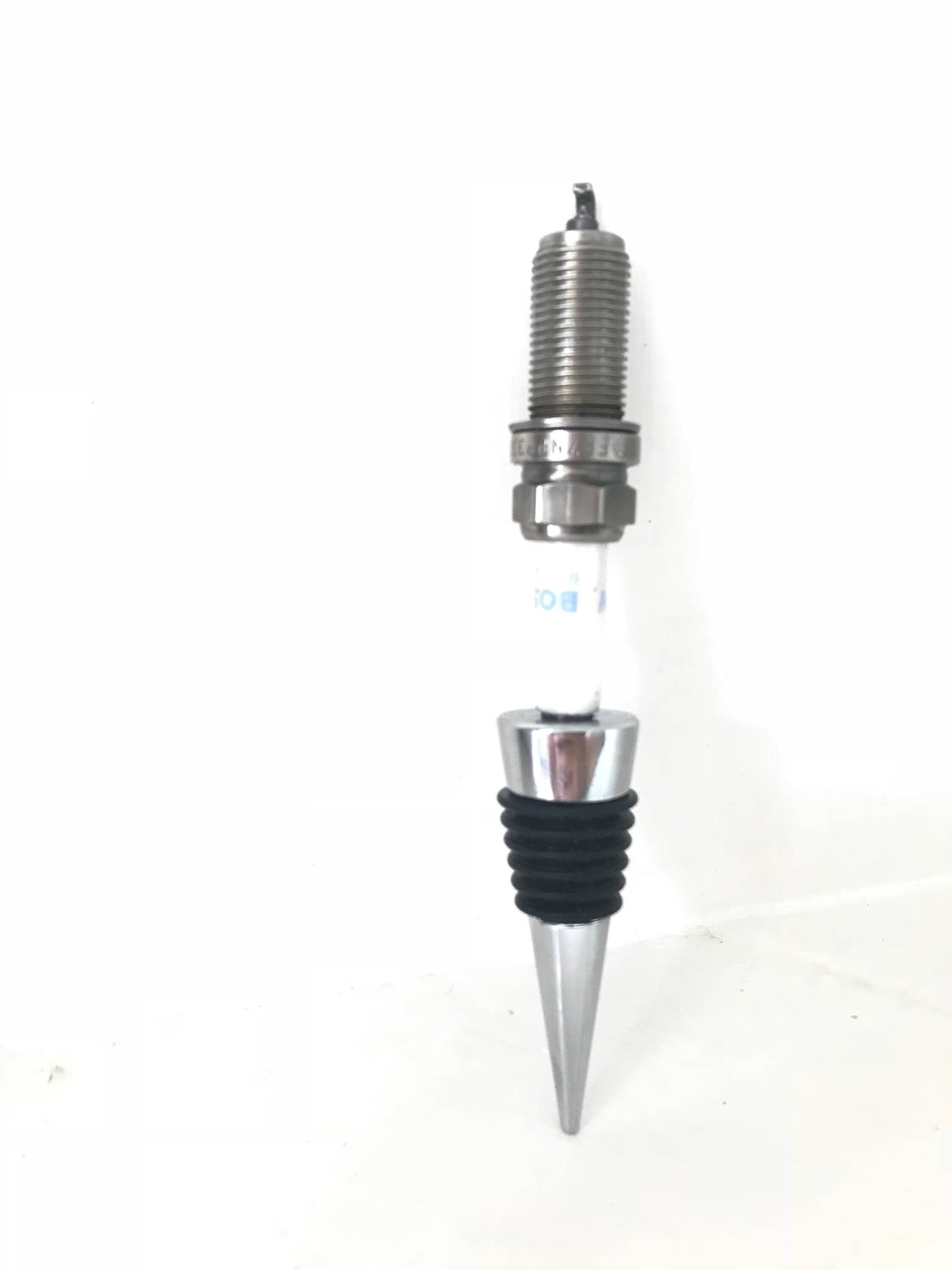 Bottle stopper made from a car's spark plug.