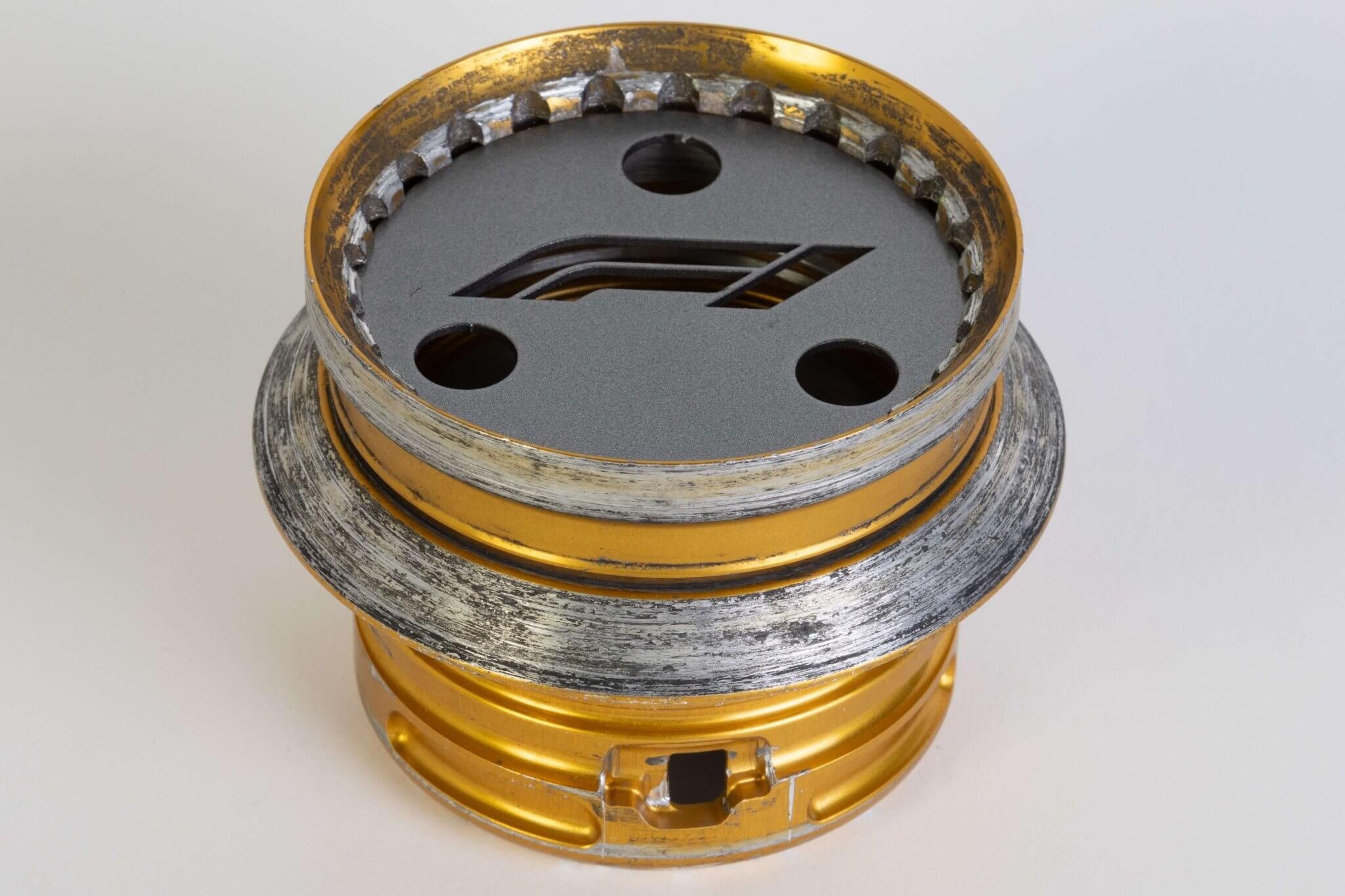 McLaren F1 Rear Wheel Nut Pen Holder - Gold Formula One Desk Decor - Ben's Auto Decor