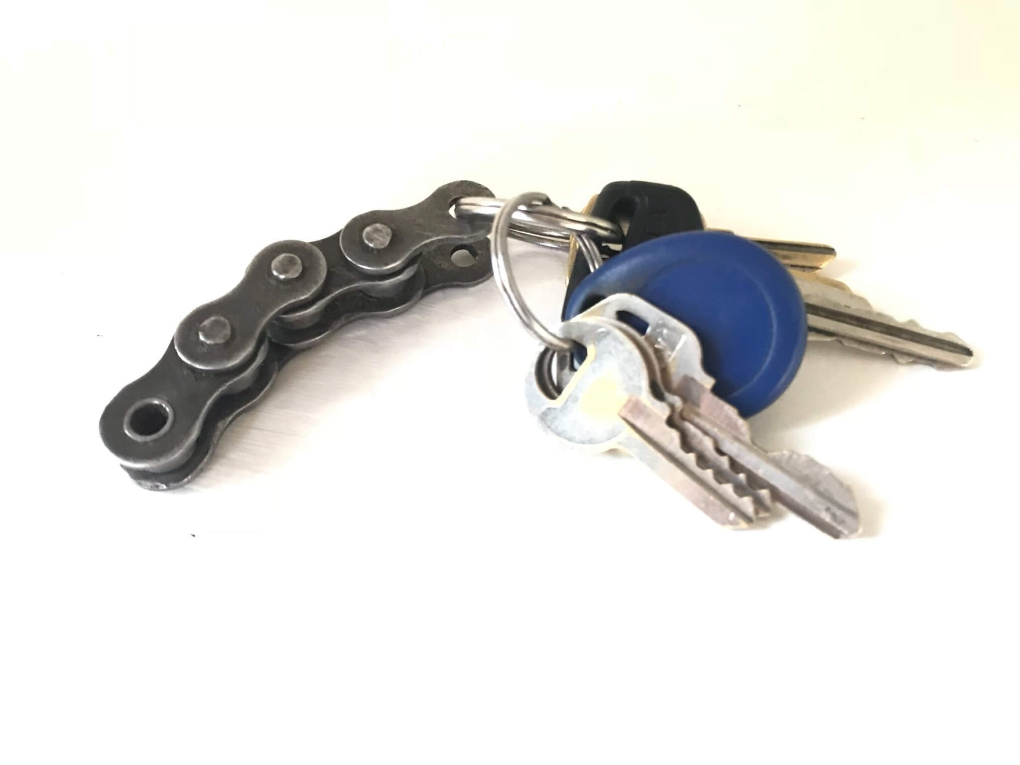 Keychain handcrafted from a genuine polished motorcycle chain.