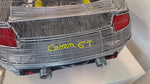 Load and play video in Gallery viewer, Video of a model of a Porsche Carrera GT car made entirely out of wire.
