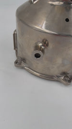 Load and play video in Gallery viewer, Video of a lamp with no shade made from a McLaren car&#39;s clutch housing in a shiny finish.
