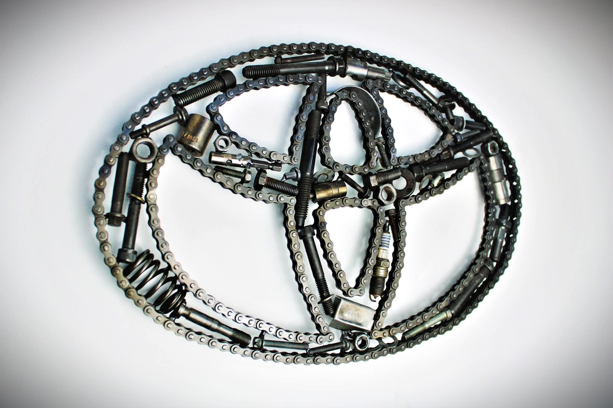 Toyota Logo Car Part Art - Automotive Wall Art, Handcrafted Gift for Auto Enthusiasts - Ben's Auto Decor