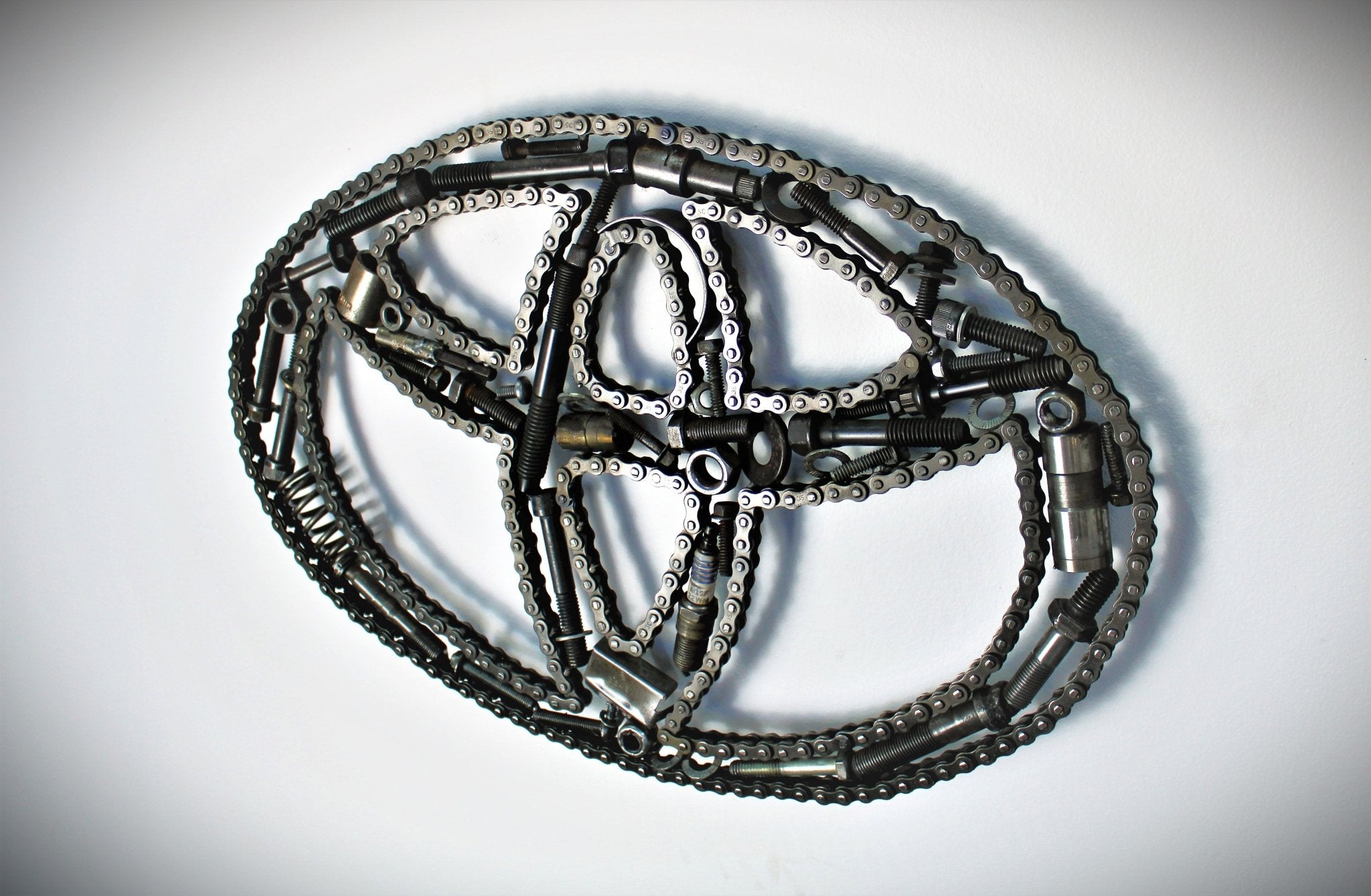 Toyota Logo Car Part Art - Automotive Wall Art, Handcrafted Gift for Auto Enthusiasts - Ben's Auto Decor