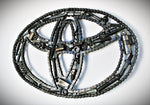 Load image into Gallery viewer, Toyota Logo Car Part Art - Automotive Wall Art, Handcrafted Gift for Auto Enthusiasts - Ben&#39;s Auto Decor
