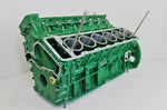 Load image into Gallery viewer, Jaguar V12 engine block coffee table, finished in British Racing Green without its glass top, the Jaguar logo displayed in the center.
