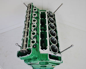 Birds-eye view of a Jaguar V12 engine block coffee table, finished in British Racing Green without its glass top.