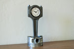 Load image into Gallery viewer, A piston clock made from a Jaguar car&#39;s piston, finished in gunmetal gray.
