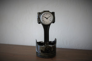 Clock made out of a Chevrolet car's piston.